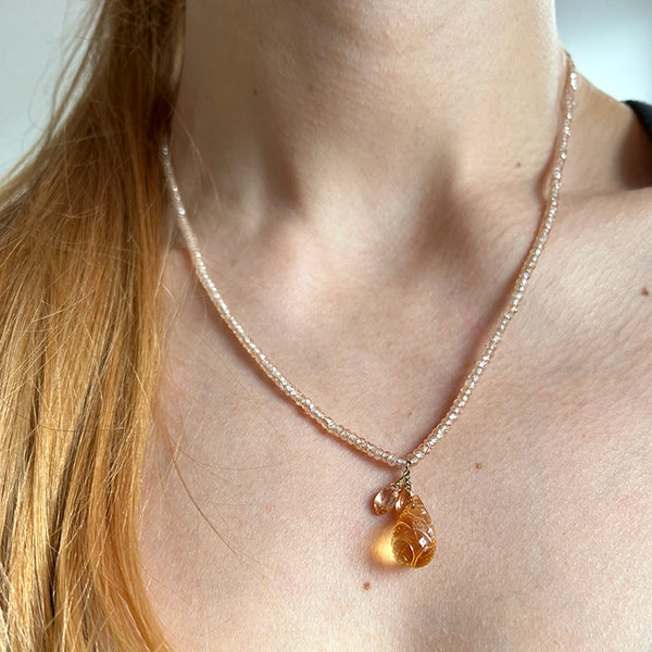 Nude-colored faceted CZ with hanging Citrine Briolettes